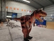 Modelo ocultado Carnotaurus adulto del traje del dinosaurio de la pierna