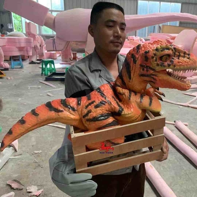 Marioneta de mano realista de encargo del dinosaurio, marioneta de mano de T Rex del parque temático