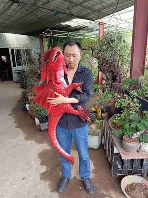 La marioneta realista Animatronic del bebé del dinosaurio del control de la mano modificó para requisitos particulares