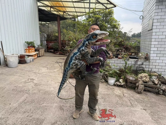 comprar Personalizado Realista Bebé Animatrónica Dinosaurio Muñeco de Mano online manufacture