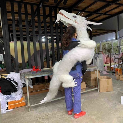 Un buen precio. Control manual modificado para requisitos particulares color de la marioneta de mano del dinosaurio de goma en línea